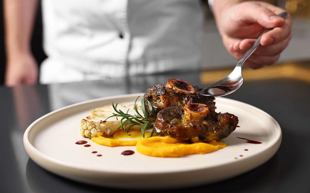 private chef preparring a dish