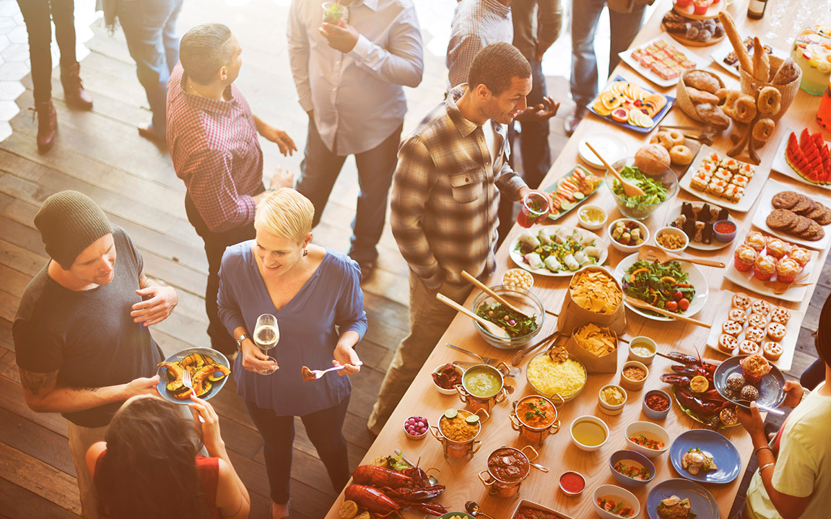 friends talking and eating during party