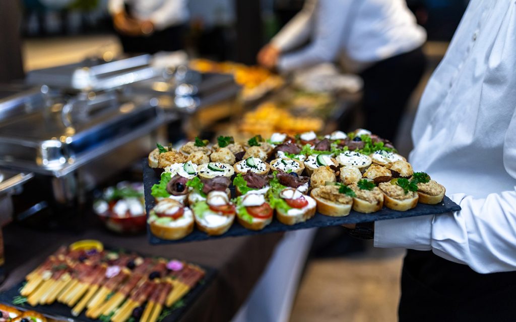 servers with food during an event