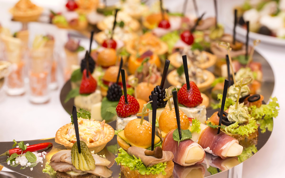 Canapés of cheese, meat and seafood