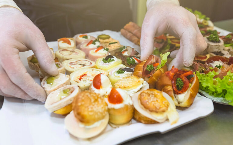 Close up of chef preparing food appetizers canape snacks